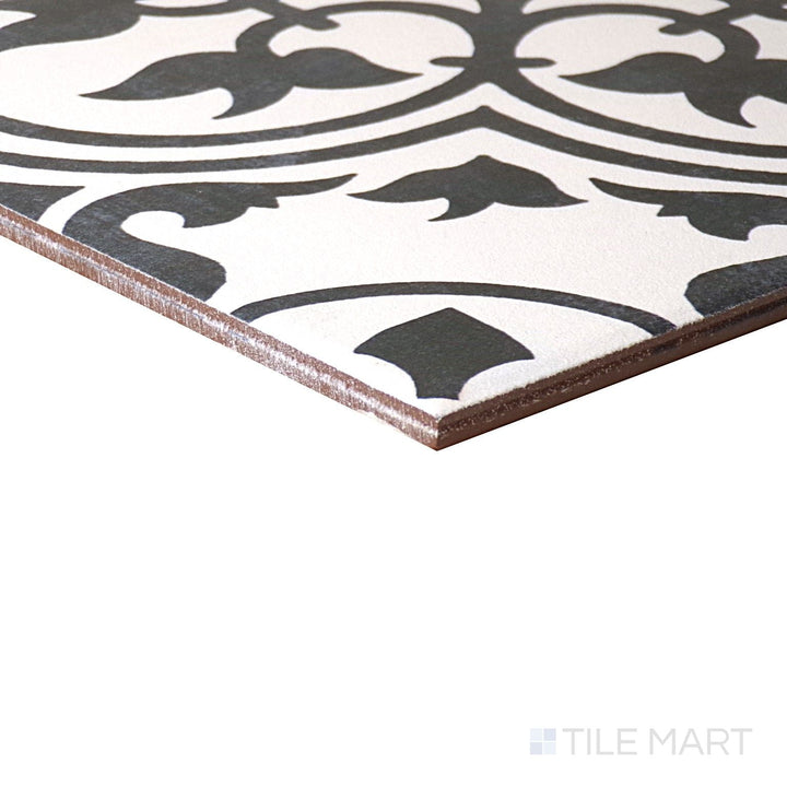 Close-up corner shot of Memoir Petal Black 12X12 Matte Glazed Ceramic Tile, featuring its elegant black hue with a subtle floral-inspired matte finish.