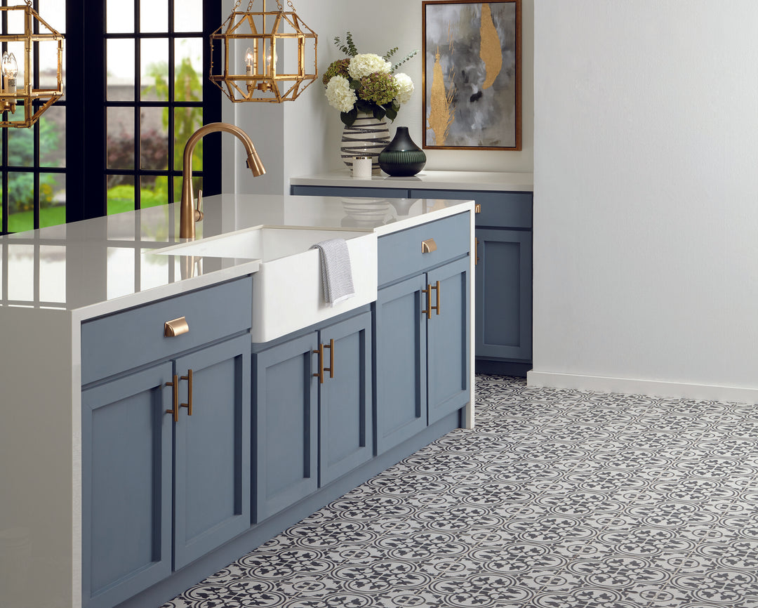 Lifestyle of Memoir Petal Black 12x12 matte glazed ceramic tile illustrating its artistic floral imprint and rich black finish in a bold, textured presentation.