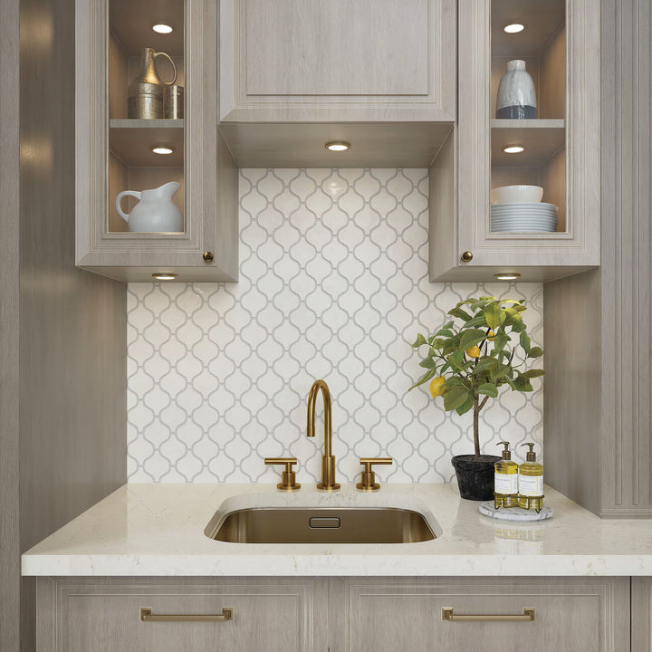 Roomscene capturing Mesmerist Spirit Arabesque Glossy Glazed Ceramic Mosaic, presenting intricate arabesque patterns with a glossy sheen.