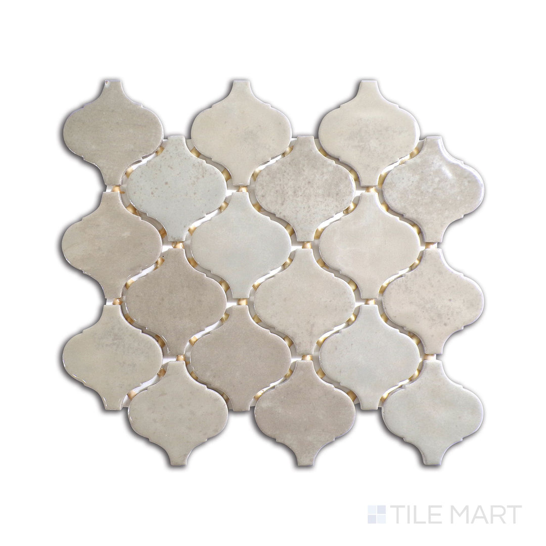 Diagonal view of Mesmerist Trance Arabesque glossy glazed ceramic mosaic, showcasing its fluid arabesque design, high-gloss sheen, and artistic flair.  