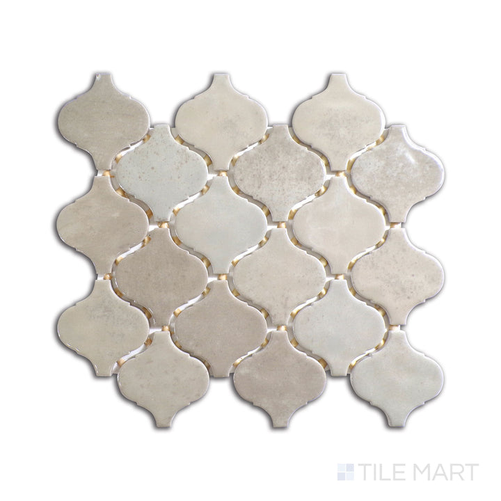 Diagonal view of Mesmerist Trance Arabesque glossy glazed ceramic mosaic, showcasing its fluid arabesque design, high-gloss sheen, and artistic flair.  