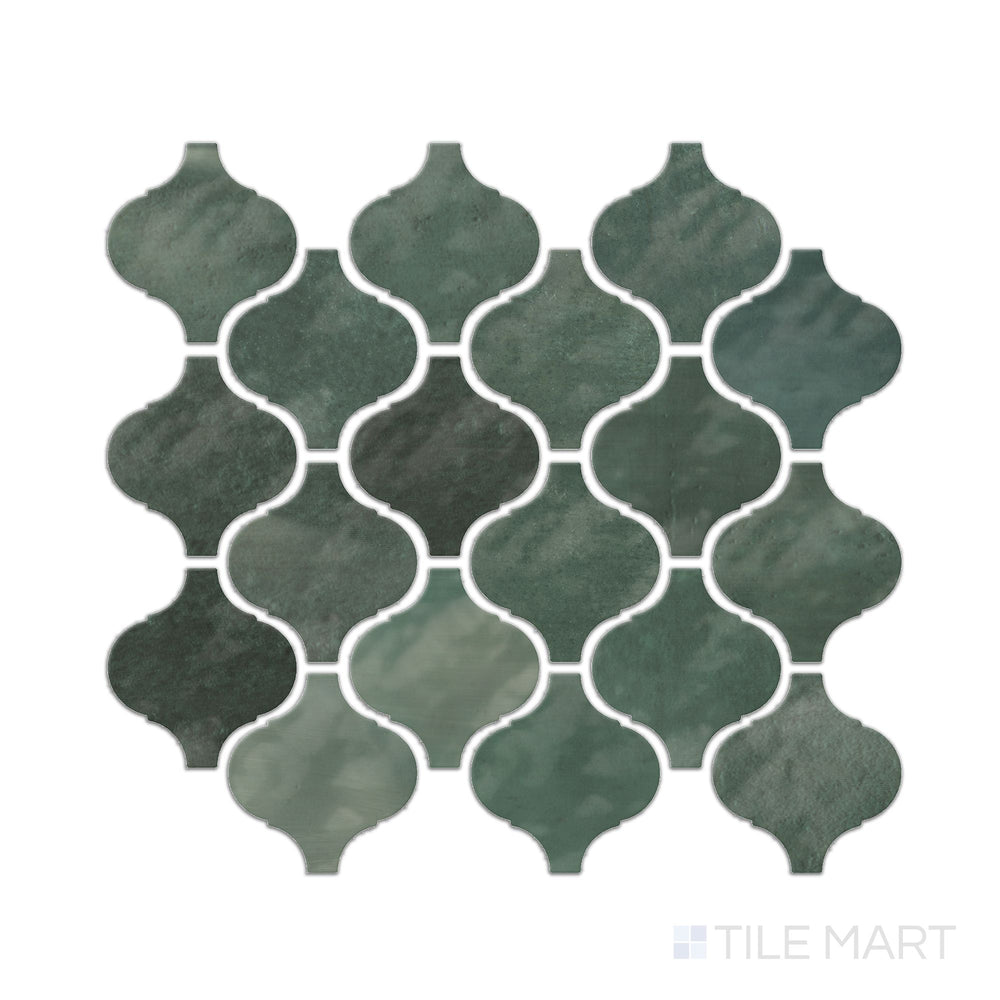 A top-down view of the Mesmerist Allure Arabesque glossy glazed ceramic mosaic tile highlights its intricate arabesque pattern with a lustrous finish, adding a touch of elegance to any space.