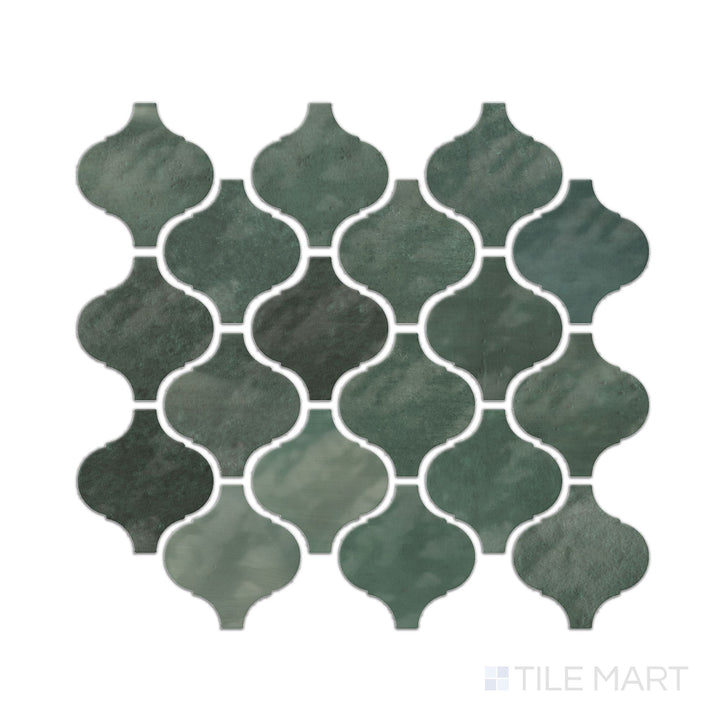 A top-down view of the Mesmerist Allure Arabesque glossy glazed ceramic mosaic tile highlights its intricate arabesque pattern with a lustrous finish, adding a touch of elegance to any space.