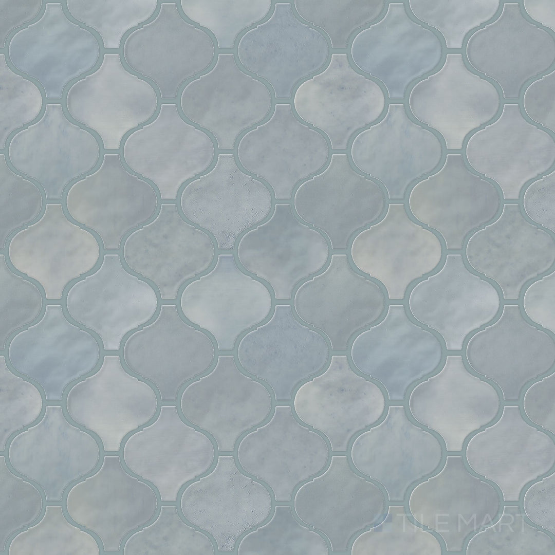 Captured from above, the Mesmerist Whimsy Arabesque glossy glazed ceramic mosaic tile showcases its artistic arabesque design with a high-gloss sheen, perfect for statement walls and accents.