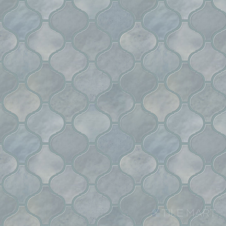 Captured from above, the Mesmerist Whimsy Arabesque glossy glazed ceramic mosaic tile showcases its artistic arabesque design with a high-gloss sheen, perfect for statement walls and accents.