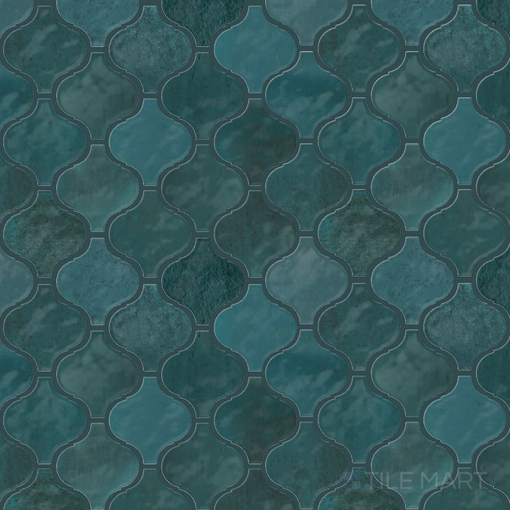 Flat-lay image of the Mesmerist Mystique Arabesque glossy glazed ceramic mosaic, emphasizing its flowing arabesque details and reflective glaze.