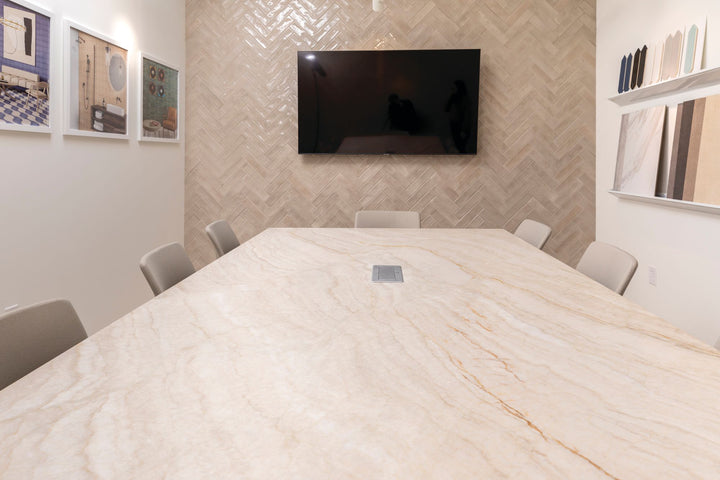 Mesmerist Trance 3x12 glossy glazed ceramic tile displayed in a stylized space, showcasing its reflective surface and sleek profile.