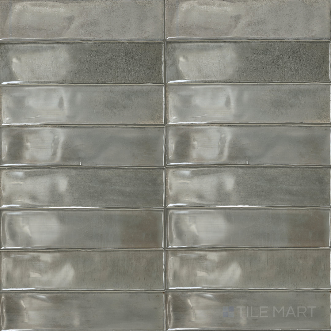 An overview of Mesmerist Charm 3x12 glossy glazed ceramic tiles, highlighting their smooth surface and elegant sheen.