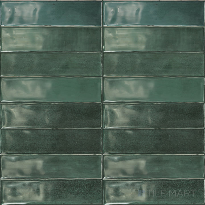 A flat-lay view of Mesmerist Allure 3x12 glossy glazed ceramic tiles, emphasizing their high-gloss finish and polished look.