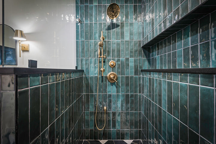 Roomscene of Mesmerist Allure 3x12 glossy glazed ceramic tile presenting a sleek, glossy surface with a linear form for a polished contemporary look.