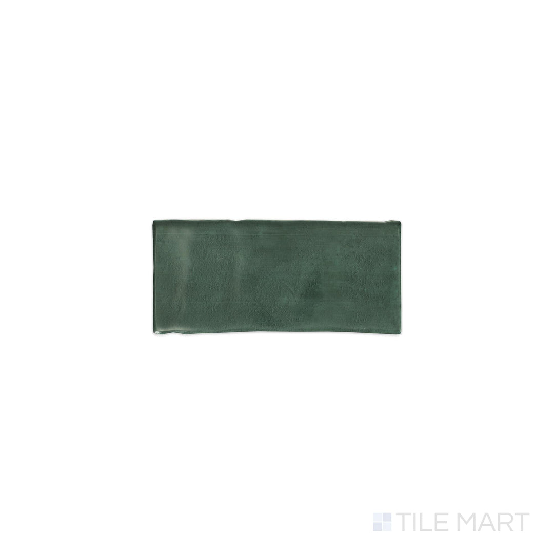 Photographed from above, the Mesmerist Allure 3x6 glossy glazed ceramic tile is shown as an individual piece with a clean rectangular form