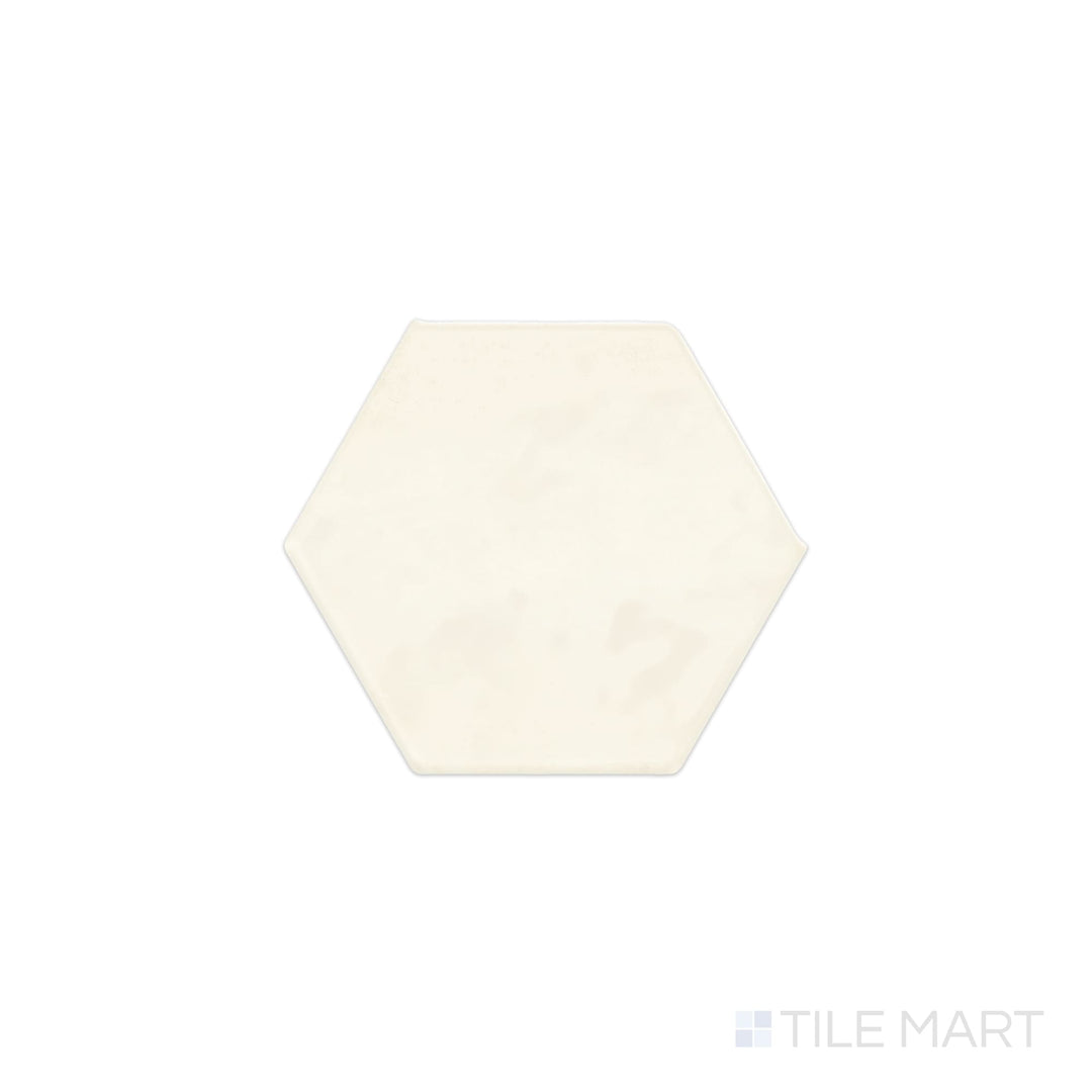 Viewed from the top, the Mesmerist Spirit 4" hex glossy glazed ceramic tile presents a striking hexagonal shape with a reflective surface, creating a bold and modern aesthetic.