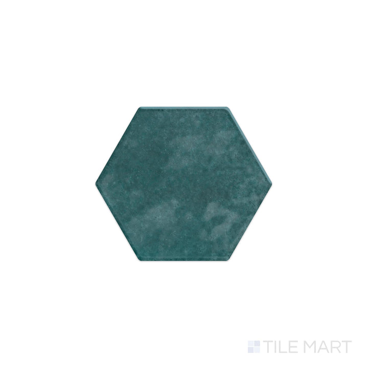 A top-down view of the Mesmerist Mystique 4" hex glossy glazed ceramic tile showcases a deep, radiant gloss with a hexagonal layout, ideal for bold and stylish interiors.