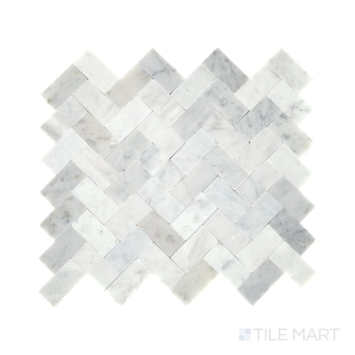 Diagonal view of Minute Mosaix Carrara White herringbone marble limestone mosaic, showcasing its classic Carrara marble veining, structured herringbone design, and polished limestone finish.  