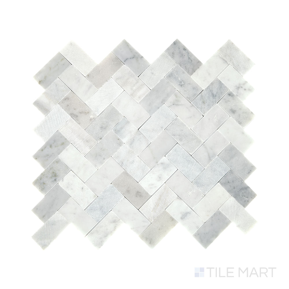 Diagonal view of Minute Mosaix Carrara White herringbone marble limestone mosaic, showcasing its classic Carrara marble veining, structured herringbone design, and polished limestone finish.  