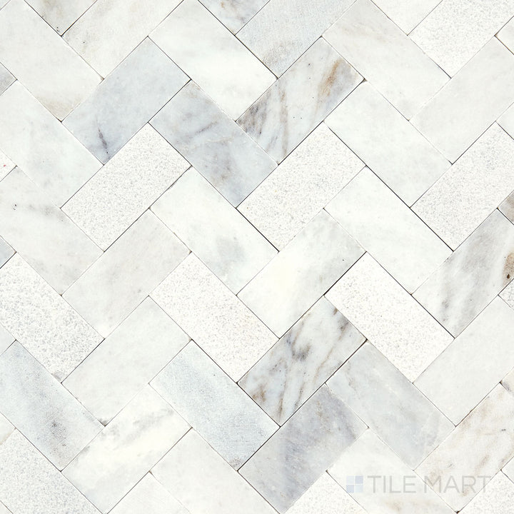 Direct overhead view of the Minute Mosaix Daphne White Herringbone marble and limestone mosaic, highlighting its crisp white hues and polished finish.