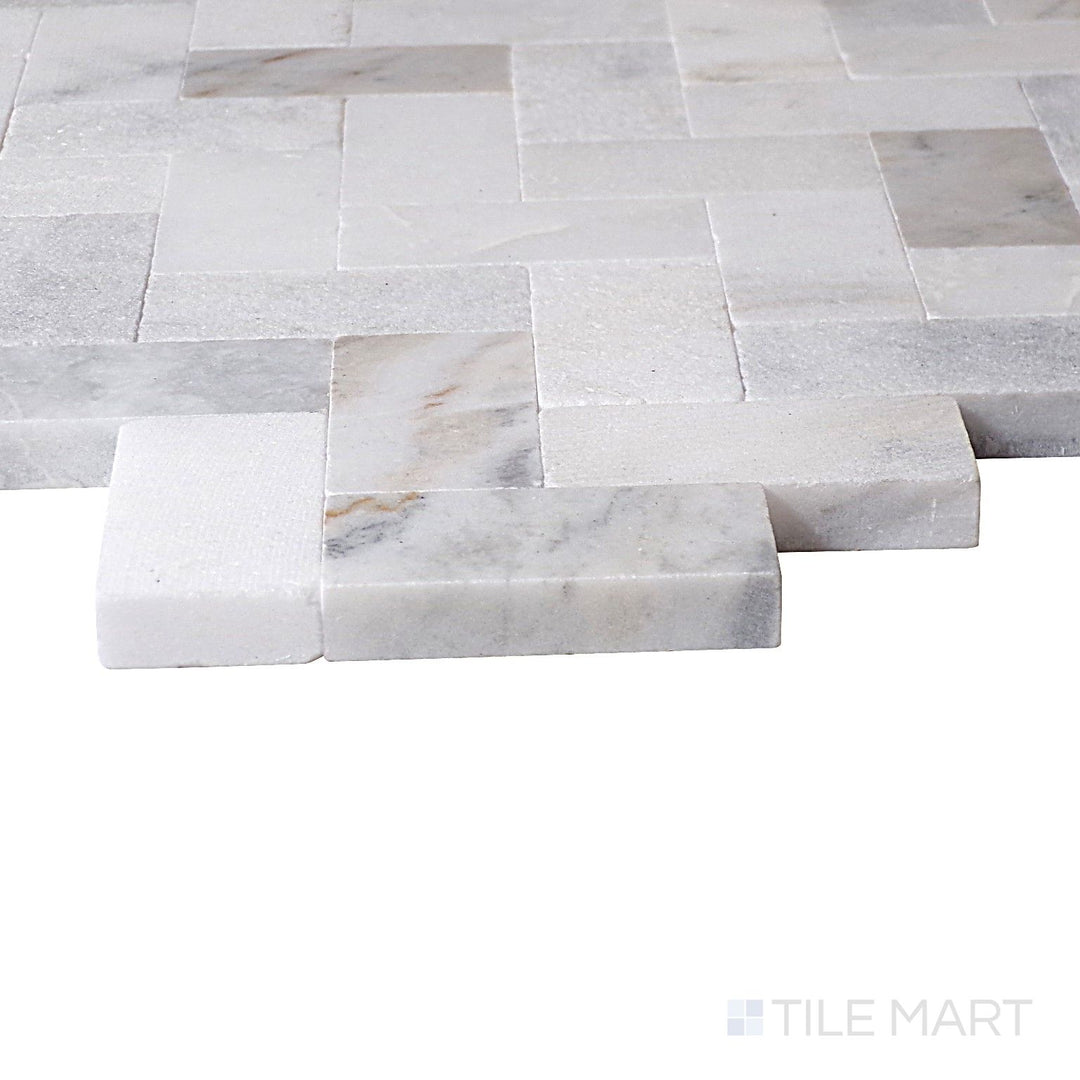 Corner angle of Minute Mosaix Daphne White Herringbone Marble, Limestone Mosaic, emphasizing its clean white finish with a luxurious herringbone pattern.