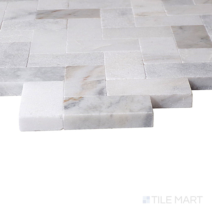 Corner angle of Minute Mosaix Daphne White Herringbone Marble, Limestone Mosaic, emphasizing its clean white finish with a luxurious herringbone pattern.