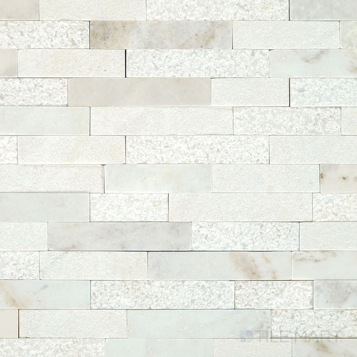 Flat-lay view of the Minute Mosaix Daphne White Random Linear marble and limestone mosaic, emphasizing its bright white color and sophisticated linear arrangement.