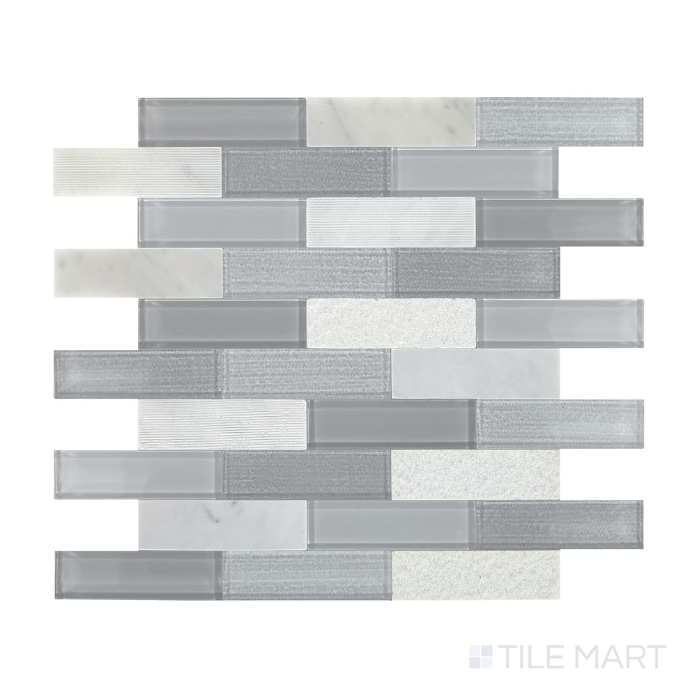 Diagonal view of Simplystick Mosaix Stormy Mist and glass blend honed and polished marble limestone mosaic, showcasing dynamic gray tones, a combination of honed and glossy textures, and a refined design.  