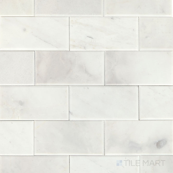 Flat-lay view of the Simplystick Mosaix Stormy Mist Honed marble and limestone mosaic, highlighting its soft honed finish and gentle misty color variations.