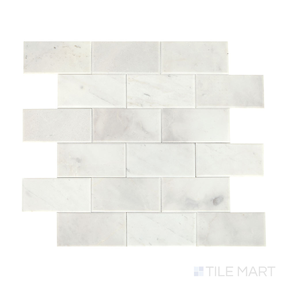 Slanted perspective of Simplystick Mosaix Stormy Mist honed marble limestone mosaic, emphasizing its deep gray hues, refined honed surface, and structured design.  