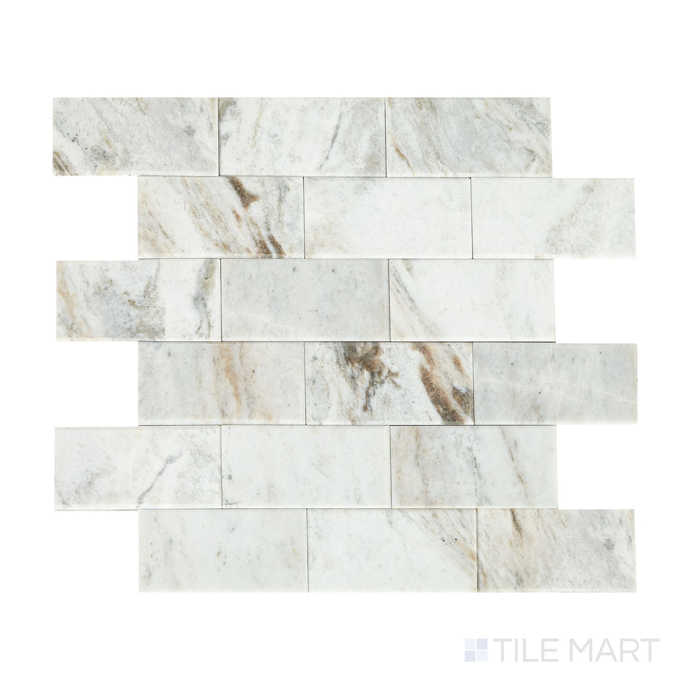 Captured from above, the Simplystick Mosaix Daphne White honed marble and limestone mosaic tile features a luxurious mix of white tones and honed textures, adding sophistication to any space.
