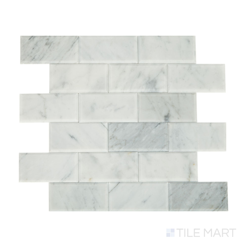 Angled shot of Simplystick Mosaix Carrara White honed marble limestone mosaic, featuring elegant Carrara veining, a subtle honed finish, and a luxurious natural stone texture.  