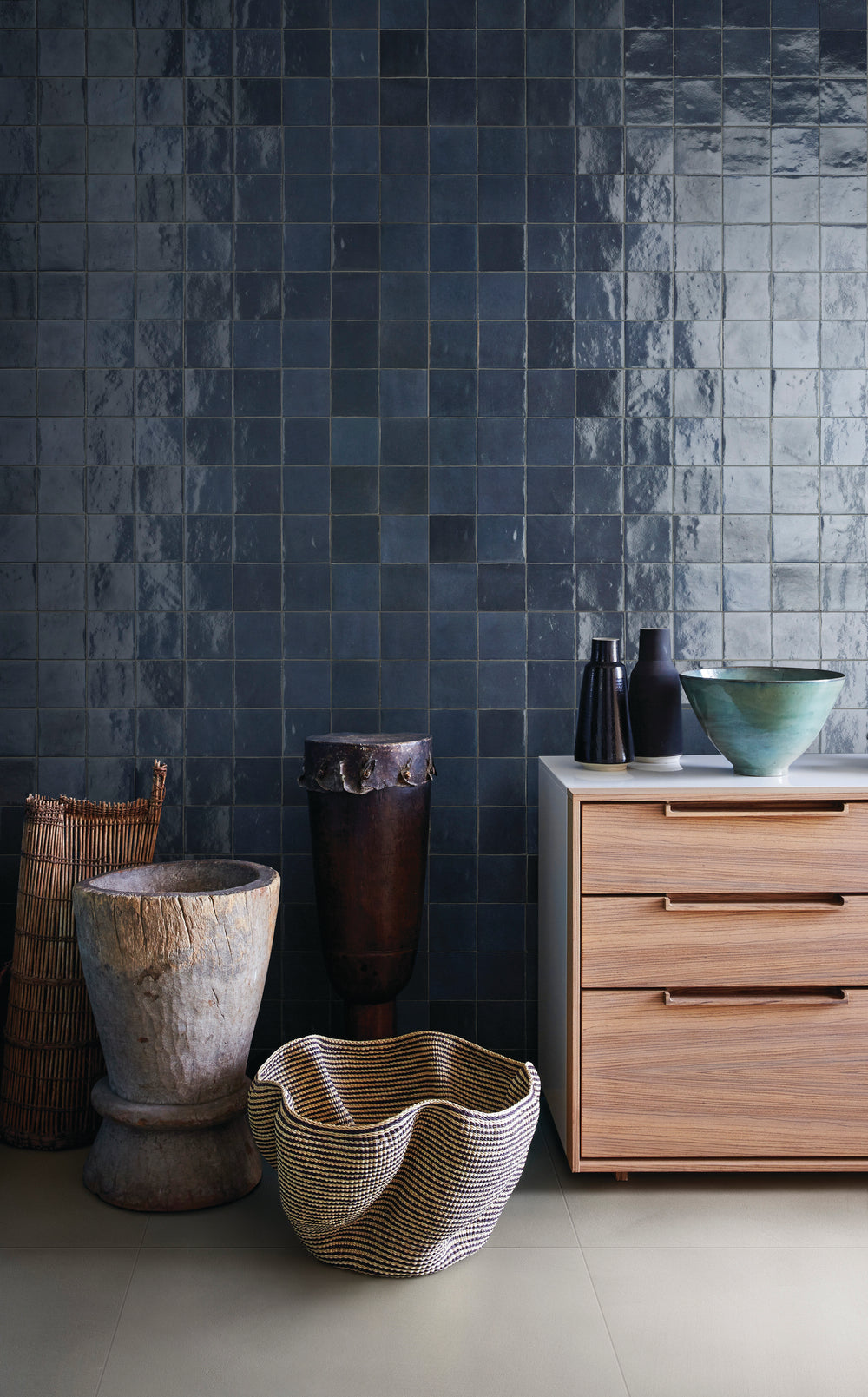 A soft off-white shade with a high-gloss glaze reflects light beautifully, adding warmth and brightness in this Zellige Neo China 4x4 glazed ceramic tile.