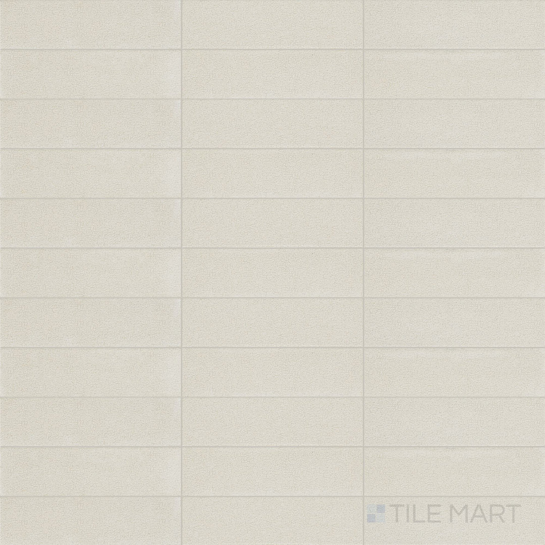 Top-down view of Inyo Crema 2X8 Satin Glazed Ceramic, showcasing its soft neutral tone with a smooth satin finish.