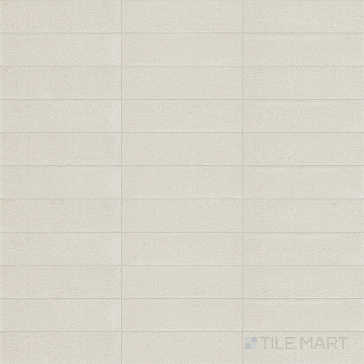 Top-down view of Inyo Crema 2X8 Satin Glazed Ceramic, showcasing its soft neutral tone with a smooth satin finish.