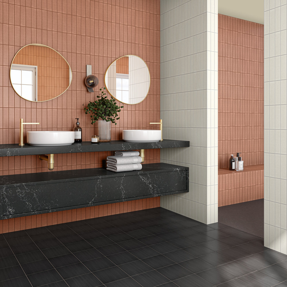 A rich ember tone with a satin finish brings warmth and depth, creating a refined look in this Inyo Ember 2x8 glazed ceramic tile.