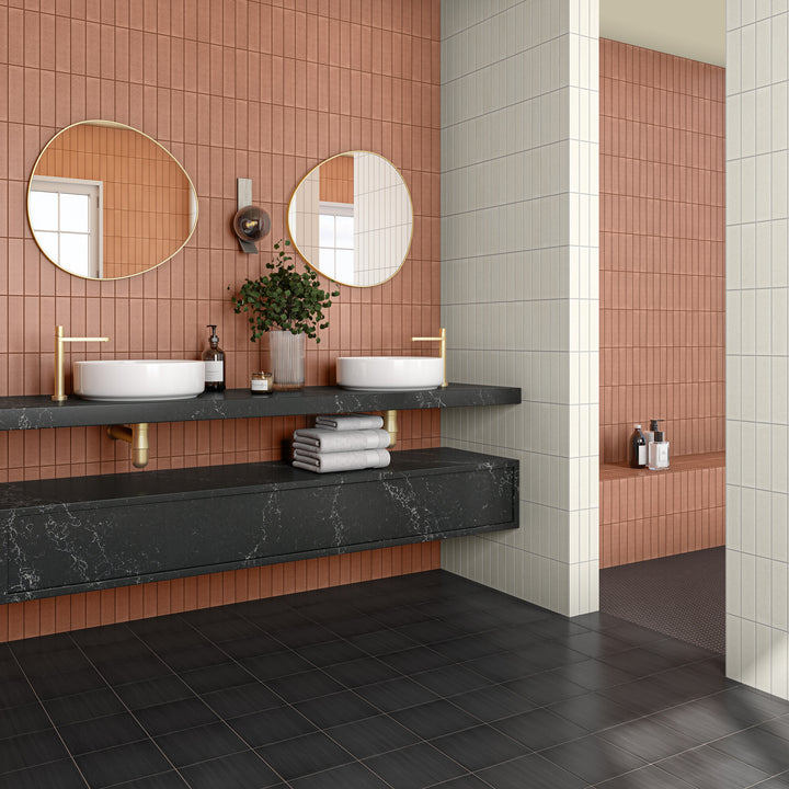 A rich ember tone with a satin finish brings warmth and depth, creating a refined look in this Inyo Ember 2x8 glazed ceramic tile.