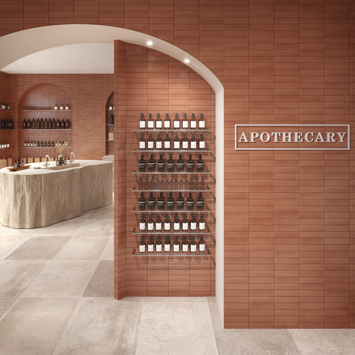 Installed in a room scene, the Inyo Ember 2x8 satin glazed ceramic tile adds warmth and subtle texture with a smooth satin surface