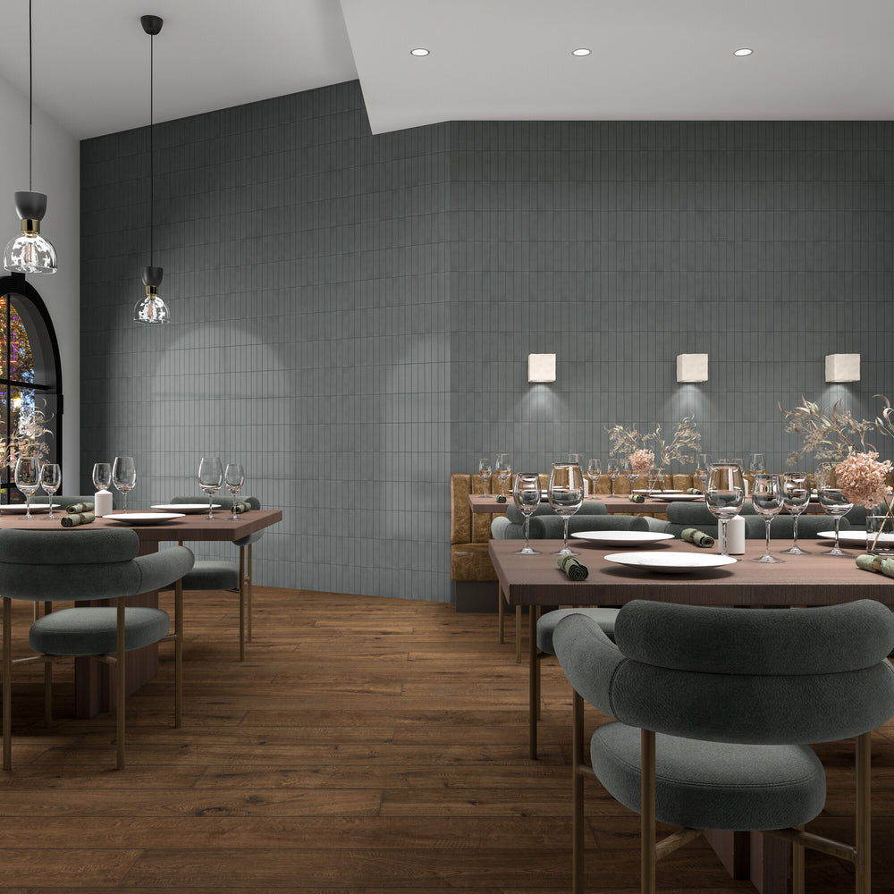 A muted olive green with a satin glaze offers an earthy and sophisticated appeal in this Inyo Olive 2x8 glazed ceramic tile.