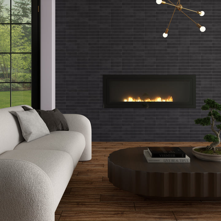 A deep ink-blue shade with a satin finish adds a bold yet smooth touch in this Inyo Ink 2x8 glazed ceramic tile.