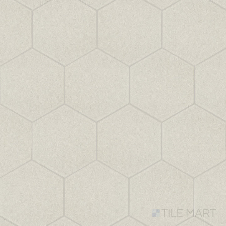 Shown as a complete tile, the Inyo Crema 8 inch hex satin glazed ceramic tile highlights its soft finish and geometric hex shape
