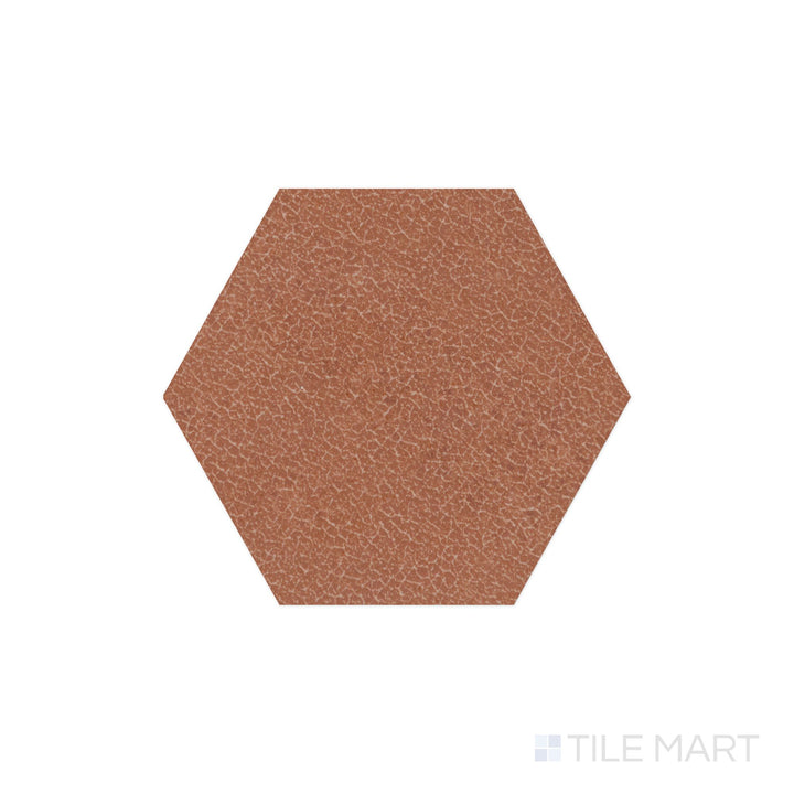 Viewed from the top, the Inyo Ember 8" hex satin glazed ceramic tile presents a rich, earthy tone with a satin glaze, bringing warmth and depth to contemporary interiors.