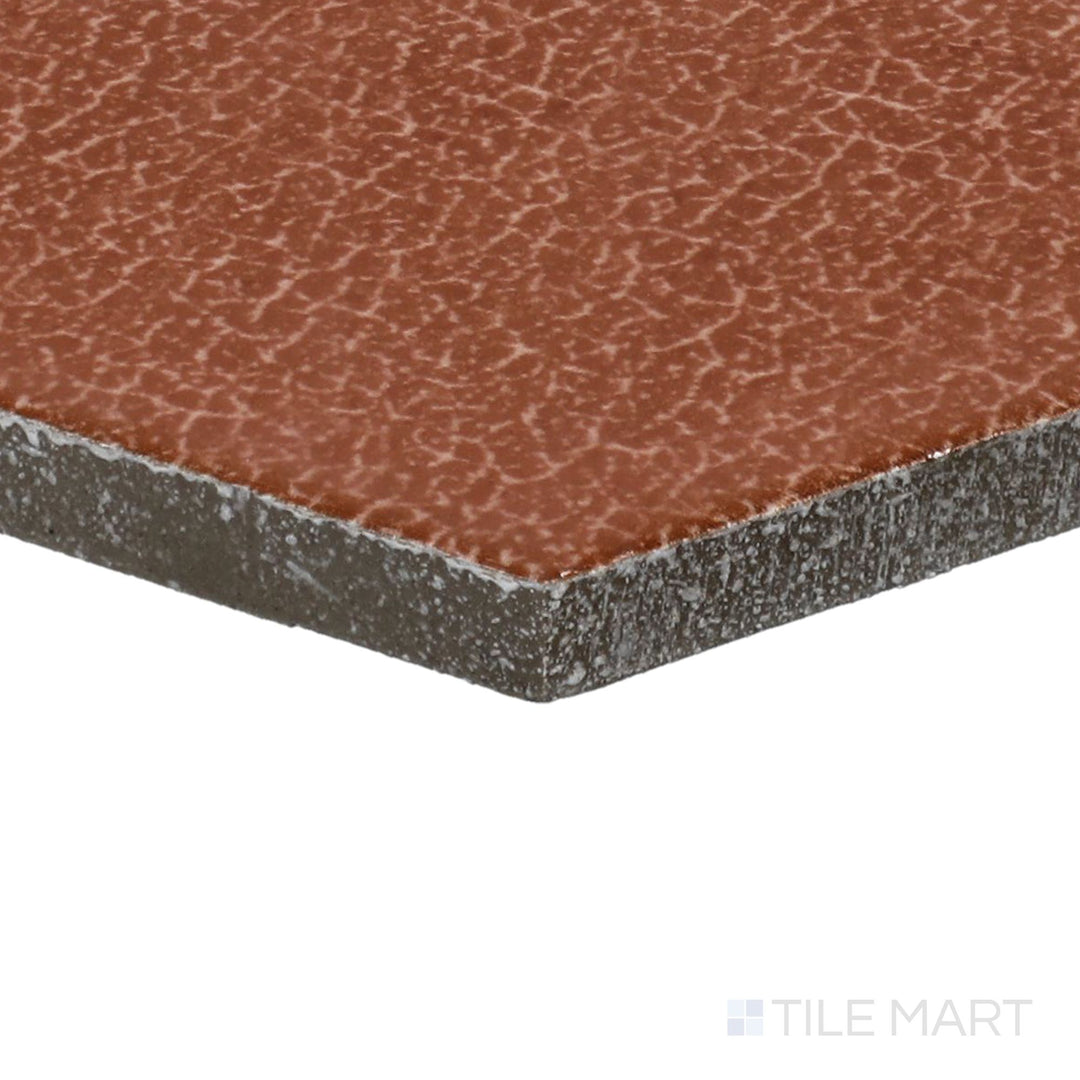 Corner-focused shot of Inyo Ember 8" Hex Satin Glazed Ceramic Tile, highlighting its warm ember tones with a contemporary hex pattern.