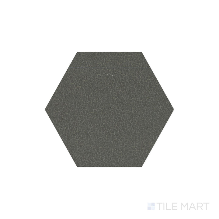 A top-down view of the Inyo Olive 8" hex satin glazed ceramic tile reveals a muted olive green shade with a soft satin finish, adding a natural and calming aesthetic to walls and floors.
