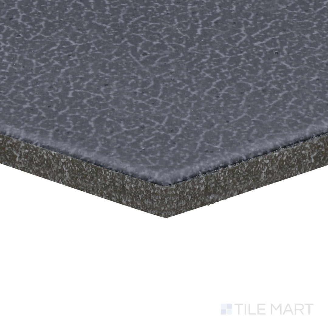 Corner angle of Inyo Indigo 8" Hex Satin Glazed Ceramic Tile, emphasizing its bold indigo tones in a geometric hexagonal format.