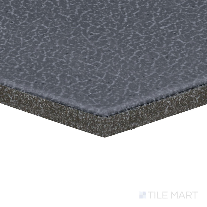 Corner angle of Inyo Indigo 8" Hex Satin Glazed Ceramic Tile, emphasizing its bold indigo tones in a geometric hexagonal format.