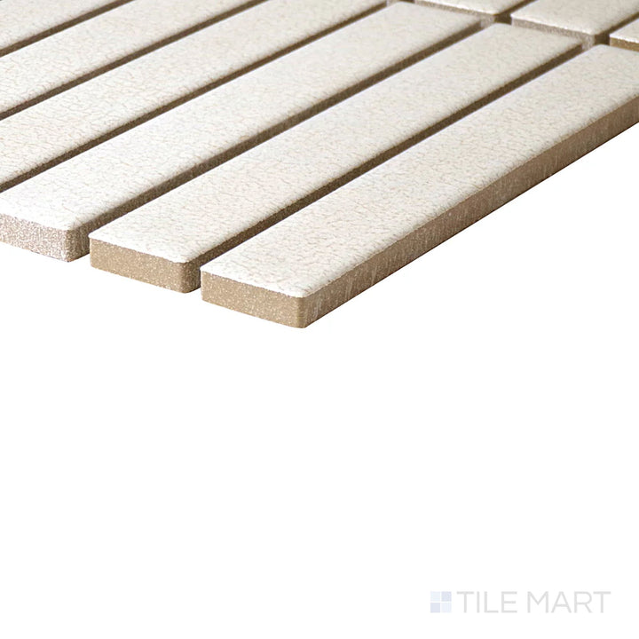 Angled close-up of Inyo Crema Rectangle Satin Glazed Ceramic Mosaic, showcasing its soft cream tones with a modern rectangular mosaic layout.