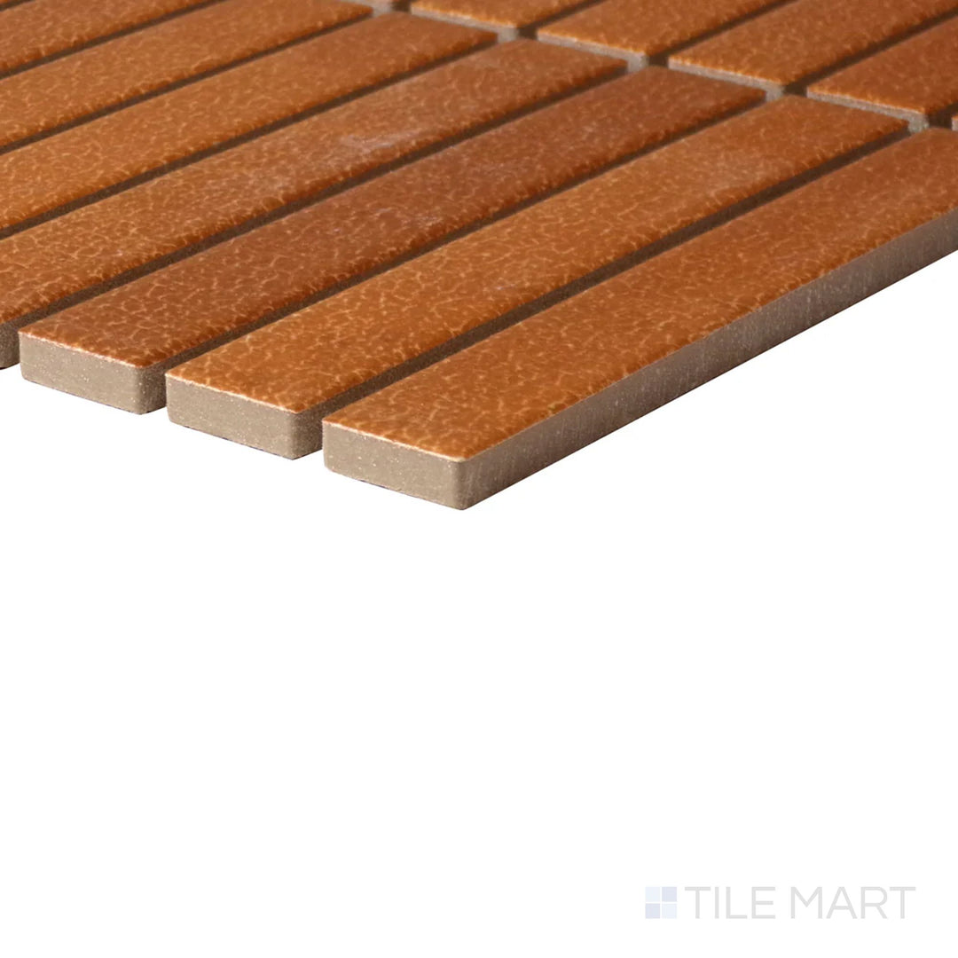 Corner-focused shot of Inyo Ember Rectangle Satin Glazed Ceramic Mosaic, highlighting its warm ember tones in a refined mosaic arrangement.