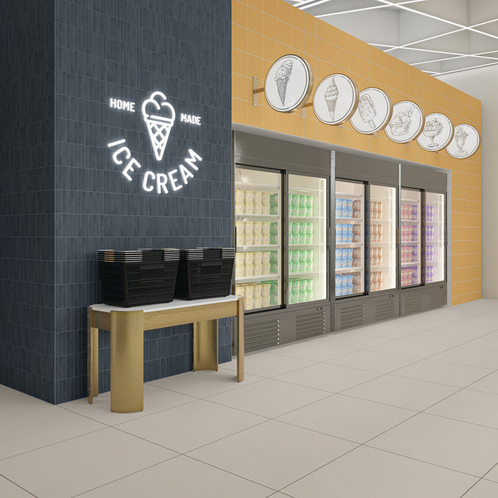 Featuring rich blue hues, this roomscene displays Inyo Indigo Rectangle satin glazed ceramic mosaic tile in a balanced layout with a subtle, silky texture.