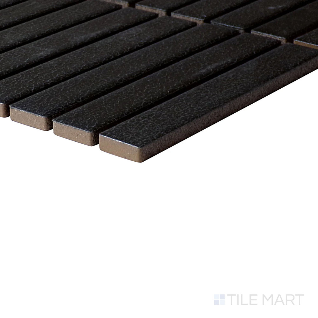 Side perspective of Inyo Ink Rectangle Satin Glazed Ceramic Mosaic, capturing its dark ink-black hues in a stylish mosaic pattern.
