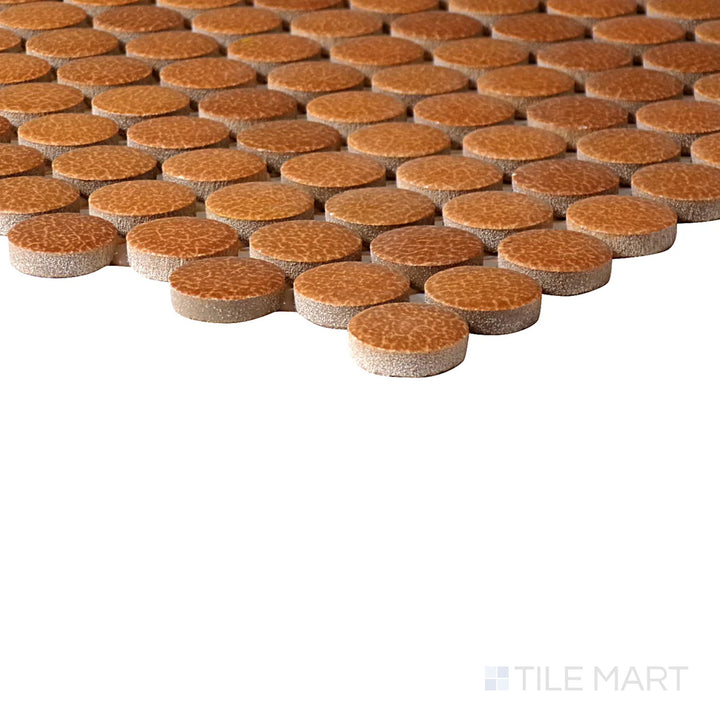 Corner-focused shot of Inyo Ember Penny Round Matte Glazed Ceramic Mosaic, highlighting its warm ember hues in a modern penny-round design.