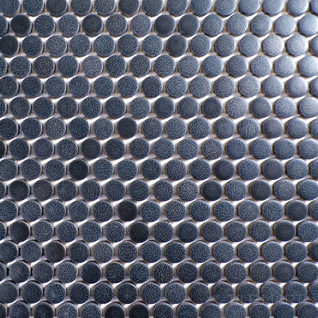 Flat-lay image of Inyo Indigo Penny Round Matte Glazed Ceramic Mosaic, highlighting its deep blue shade with a smooth matte surface.