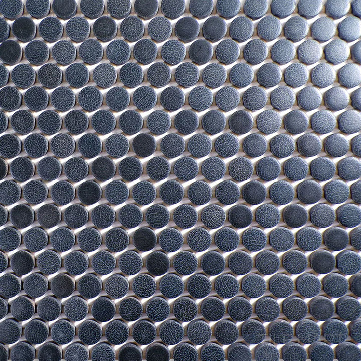 Flat-lay image of Inyo Indigo Penny Round Matte Glazed Ceramic Mosaic, highlighting its deep blue shade with a smooth matte surface.