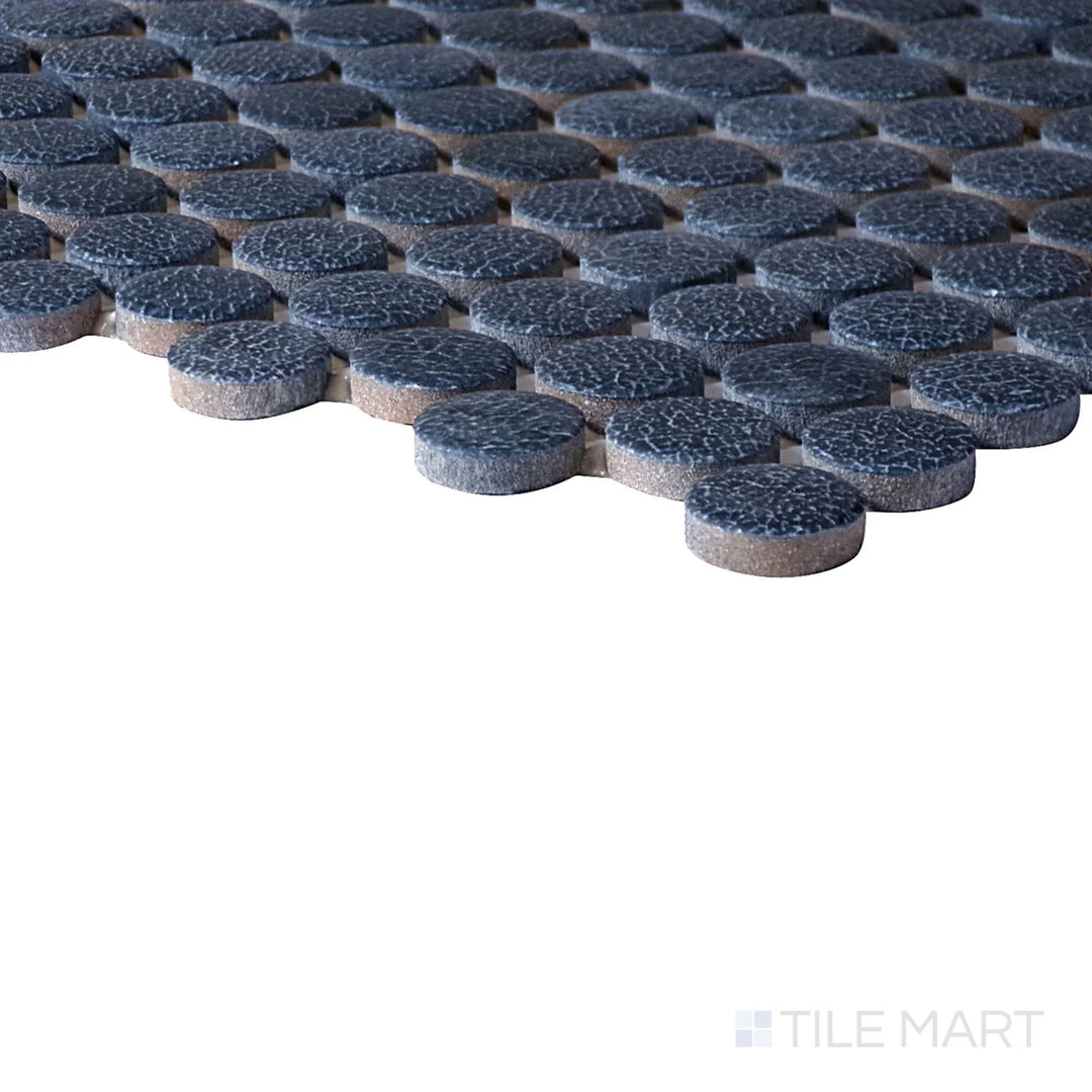 Corner angle of Inyo Indigo Penny Round Matte Glazed Ceramic Mosaic, emphasizing its rich indigo tones with a unique penny-round pattern.